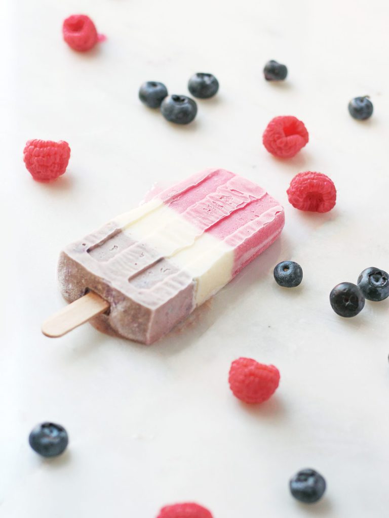 Fourth of July, Memorial Day or just a summer party, these fruit cheesecake popsicles are an all-american dessert. | www.ifyougiveablondeakitchen.com