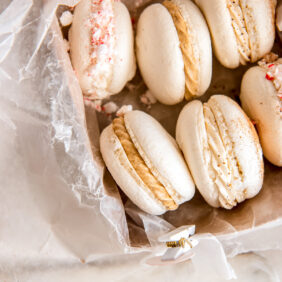 christmas macarons in a cookie box.