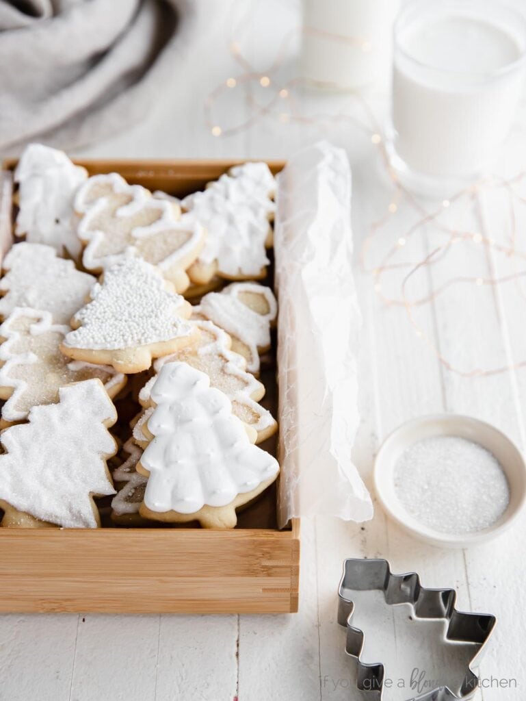 iced cut out sugar cookies in a box