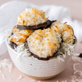 coconut macaroons and shredded coconut in a small bowl