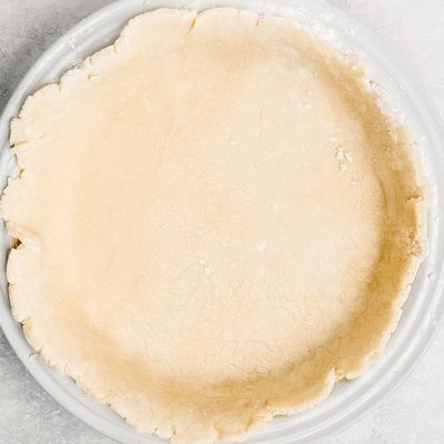 unbaked pie crust in a pie plate