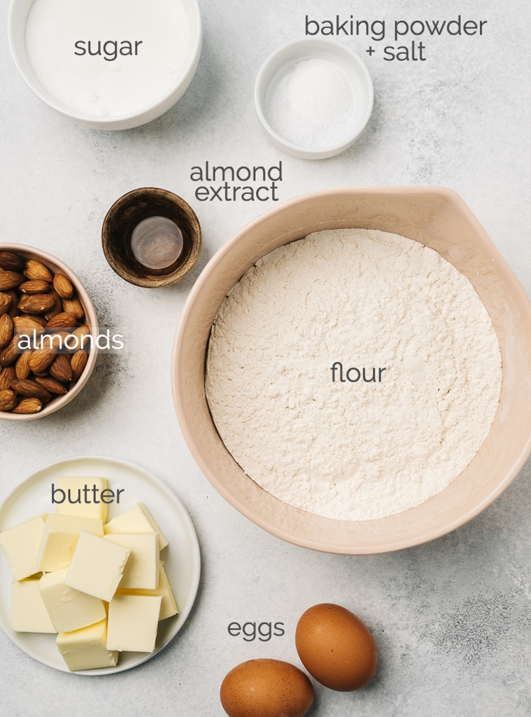 almond biscotti ingredients in bowls labeled