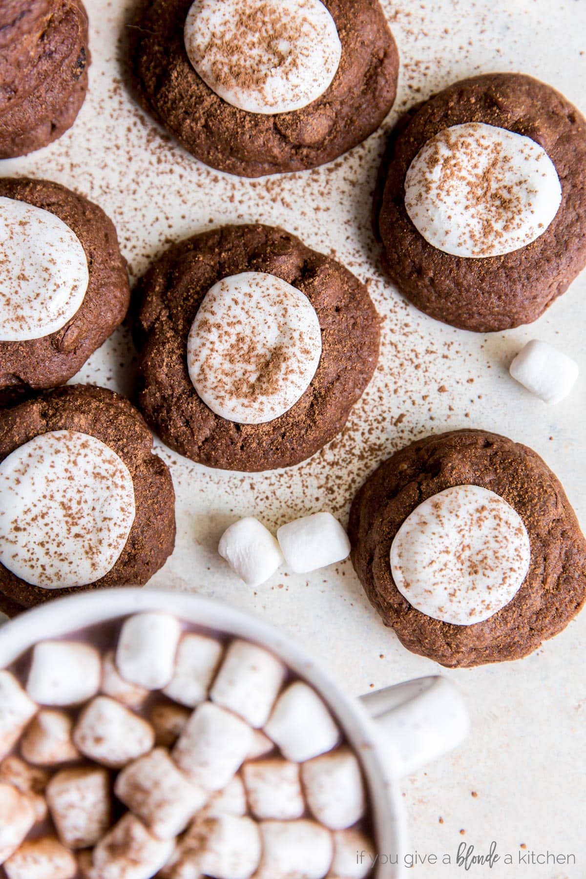 Hot cocoa cookies are made using a double chocolate chip cookie recipe. Perfect for Christmas! | www.ifyougiveablondeakitchen.com