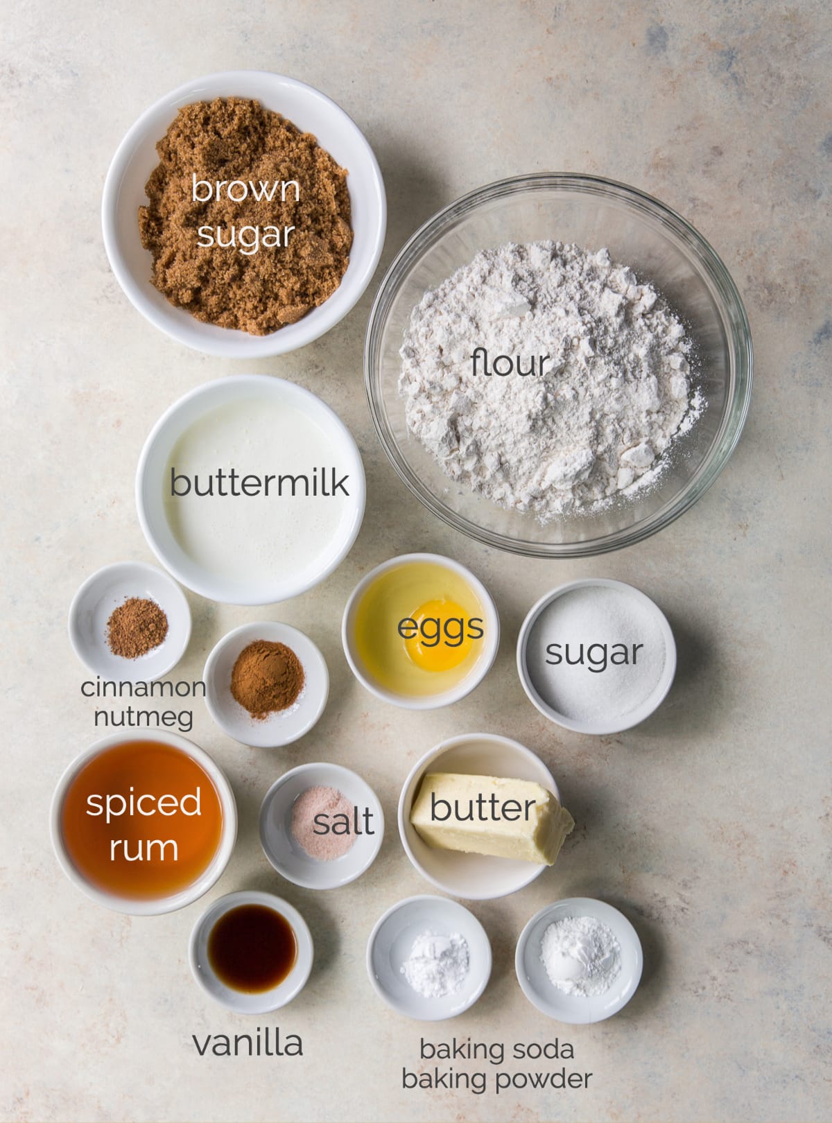buttered rum cupcakes ingredients in bowls and labeled