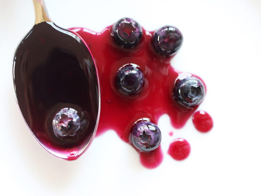 Blueberry sauce is made with only three ingredients and is delicious on ice cream and cake!| Recipe by @haleydwilliams