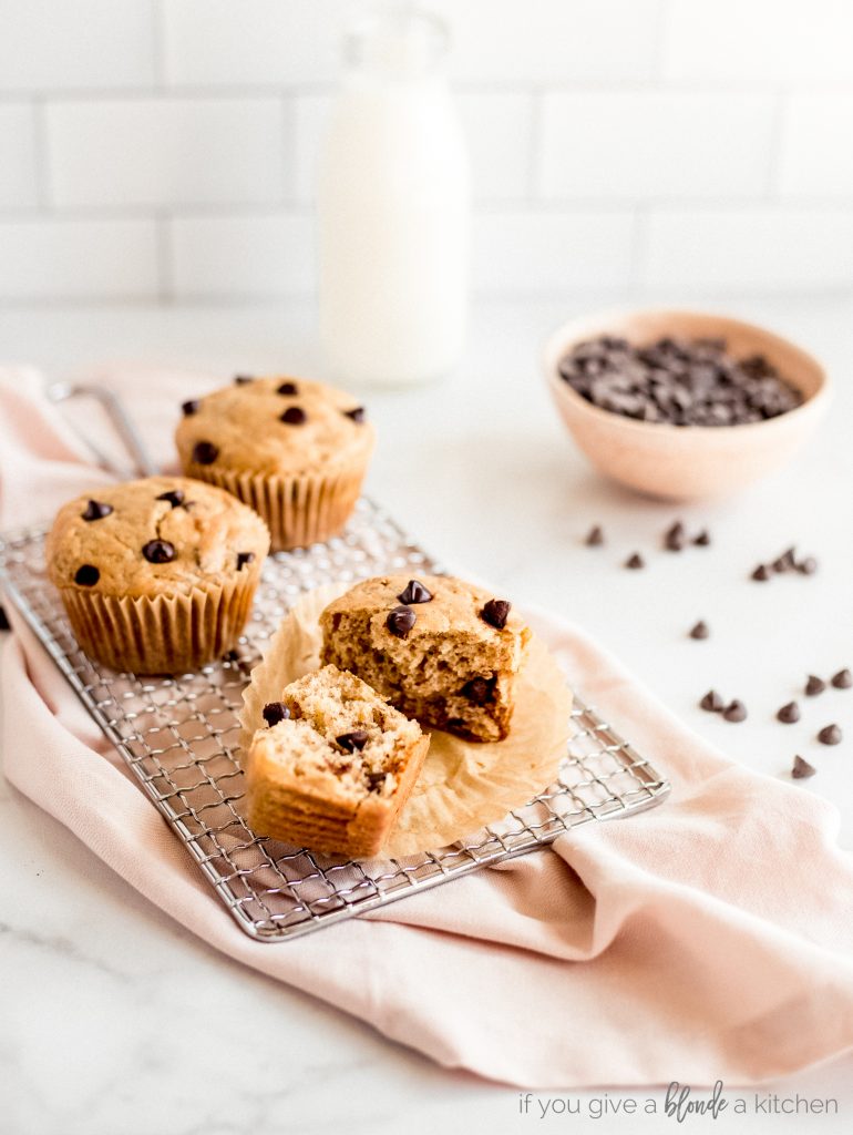 banana chocolate chip muffin halves on wire cooling rack