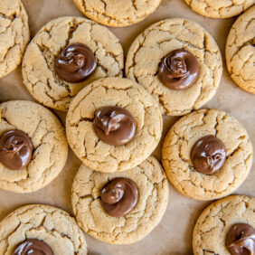 peanut butter nutella cookies on parchment paper.