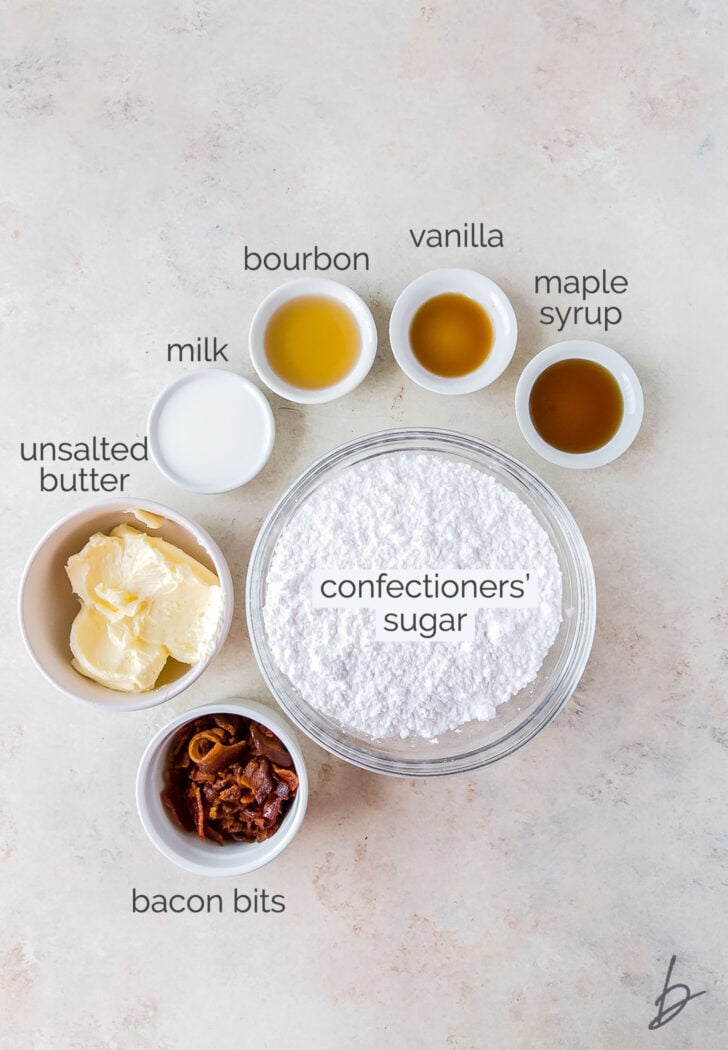 maple bourbon frosting ingredients in bowls labeled with text