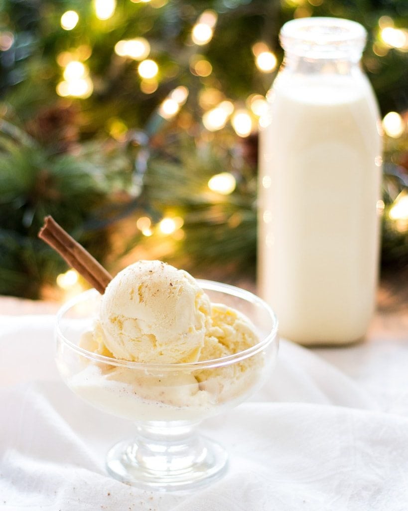 eggnog ice cream in dish and bottle of eggnog