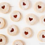 holiday linzer cookies valentines day heart with confectioners' sugar