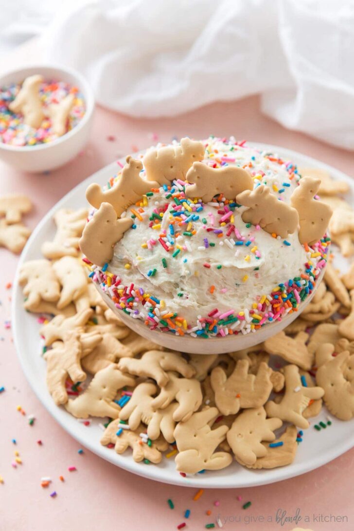funfetti dip in light pink bowl with animal crackers
