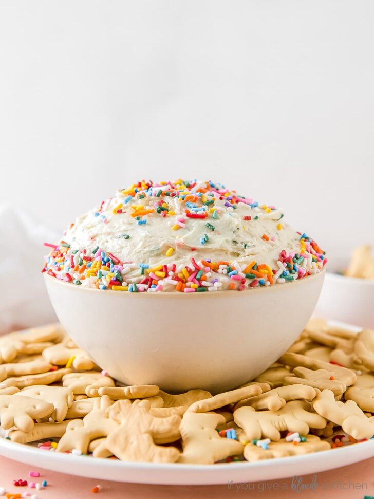 animal crackers in sprinkle covered cake dip