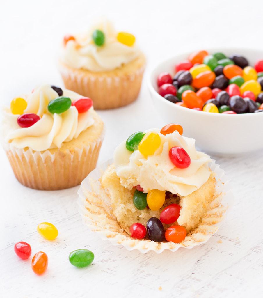 Jelly bean cupcakes are simple vanilla cupcakes decorated with jelly beans inside and out! Perfect for Easter. | www.ifyougiveablondeakitchen.com