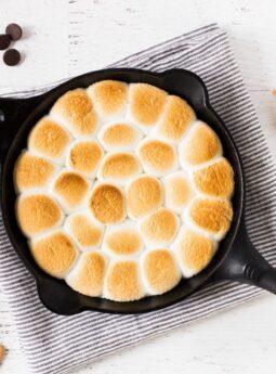 How to make smores dip with chocolate chips, marshmallows and graham crackers. | www.ifyougiveablondeakitchen.com