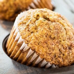 carrot zucchini muffin turned on its side in muffin in