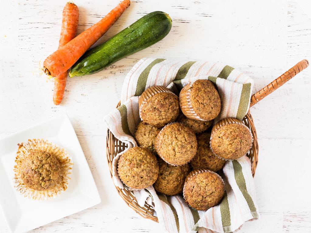 basket of carrot zucchini muffins