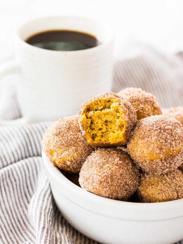 Mini pumpkin donut muffins are filled with fall flavors―cinnamon, nutmeg, cloves, and, of course, pumpkin! | www.ifyougiveablondeakitchen.com