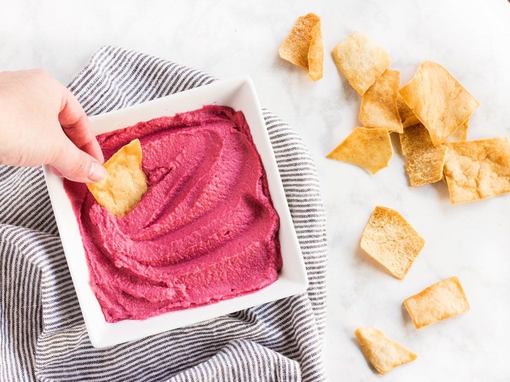 Beet hummus is healthy and delicious. This easy snack dip can be made in your Vitamix blender in minutes!