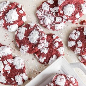 red velvet crinkle cookies with powdered sugar scattered on surface
