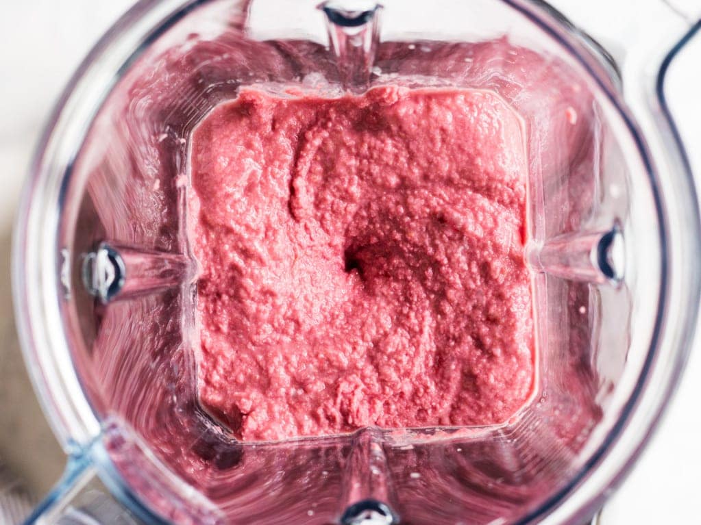 Beet hummus is made smooth in a Vitamix blender. Try this recipe for a healthy snack in the new year!