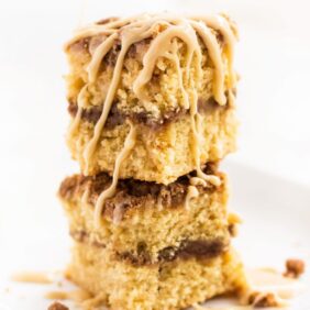 Irish cream coffee cake slices stacked with glaze