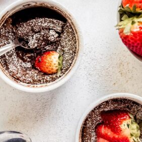 mini flourless chocolate cake in ramekin with spoon