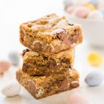 Mini egg Easter blondies stack with pastel Cadbury eggs