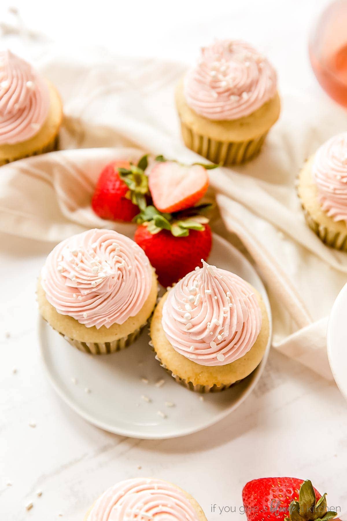 strawberry moscato cupcakes recipe pretty cupcakes with pink frosting and nonpareils sprinkles