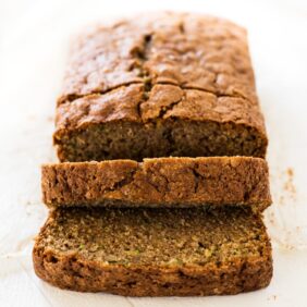 Moist zucchini bread recipe slices with cinnamon and nutmeg | www.ifyougiveablondeakitchen.com