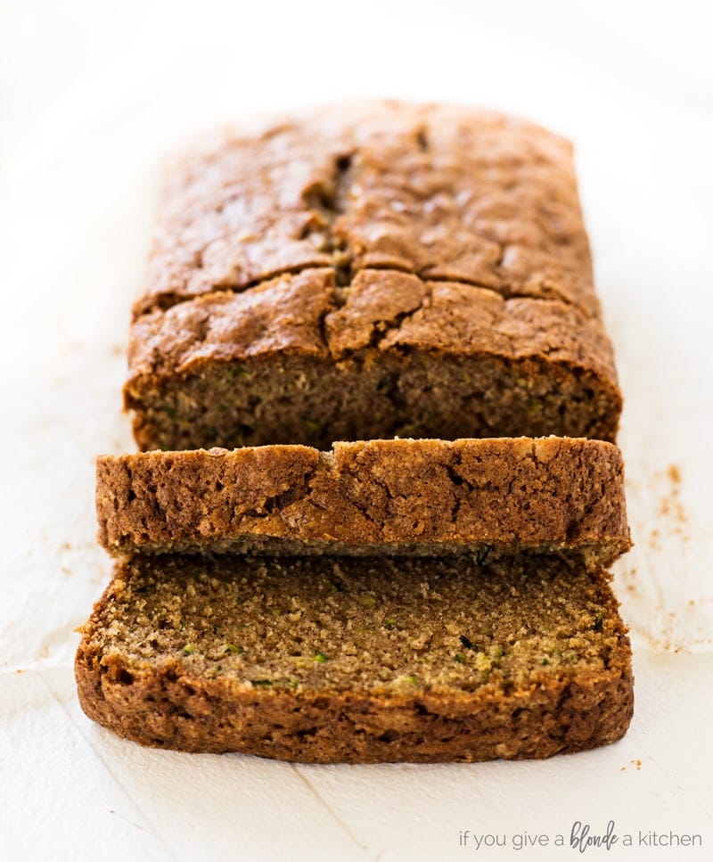 Moist zucchini bread recipe slices with cinnamon and nutmeg | www.ifyougiveablondeakitchen.com