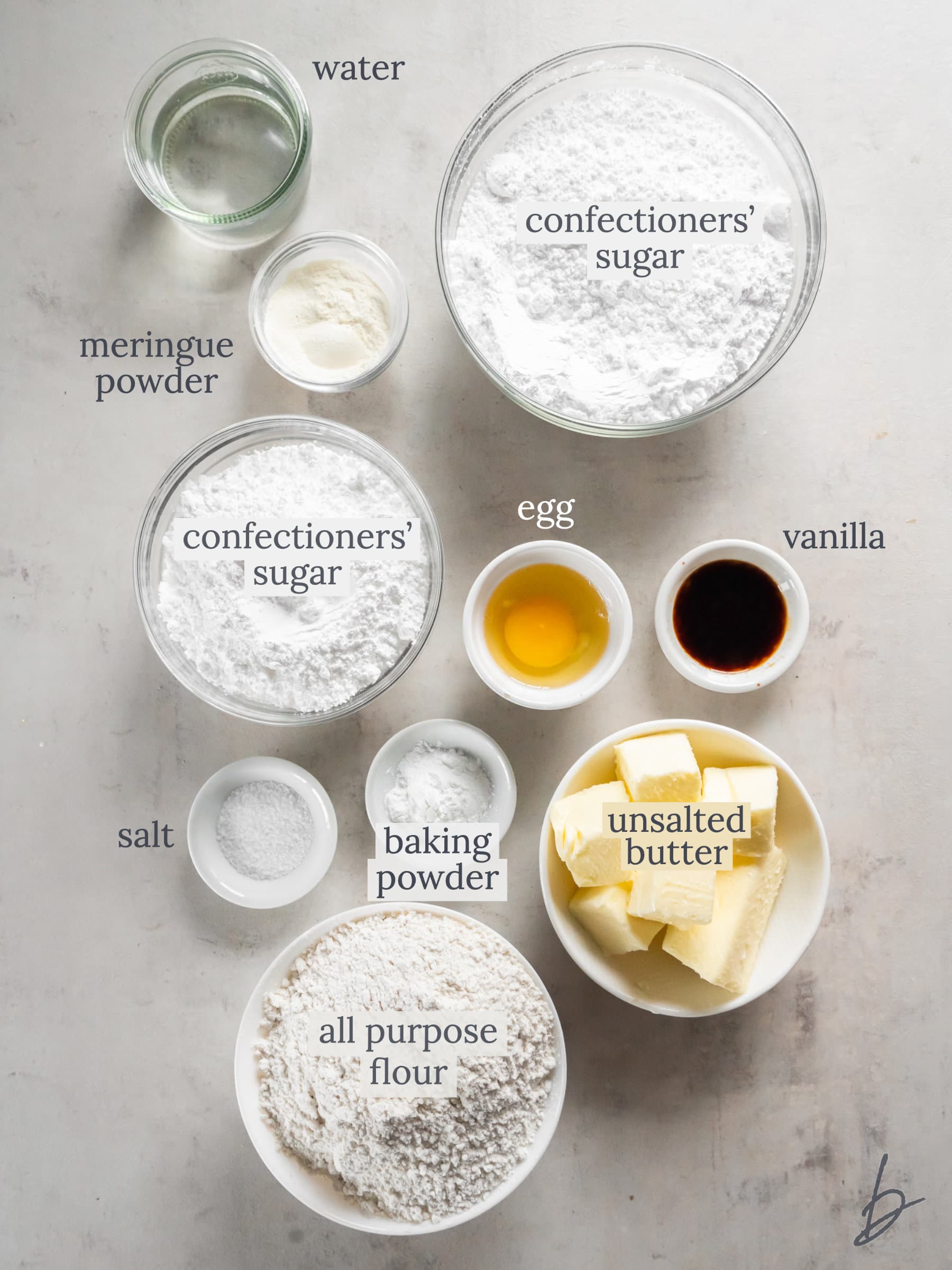 bowls of ingredients for snowflake cookies.