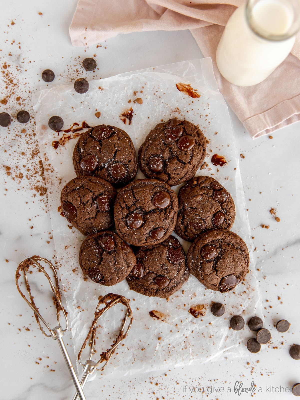 Double chocolate chip cookies recipe melted chocolate chips and sea salt with cookies close together