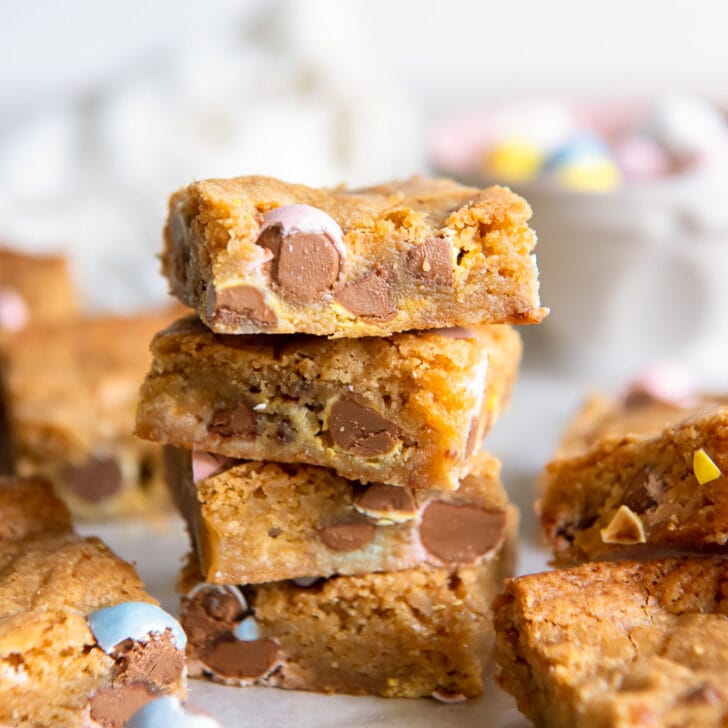 stack of four easter blondies with chopped cadbury mini eggs inside
