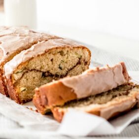 cinnamon swirl zucchini cake close up shot of cake with icing