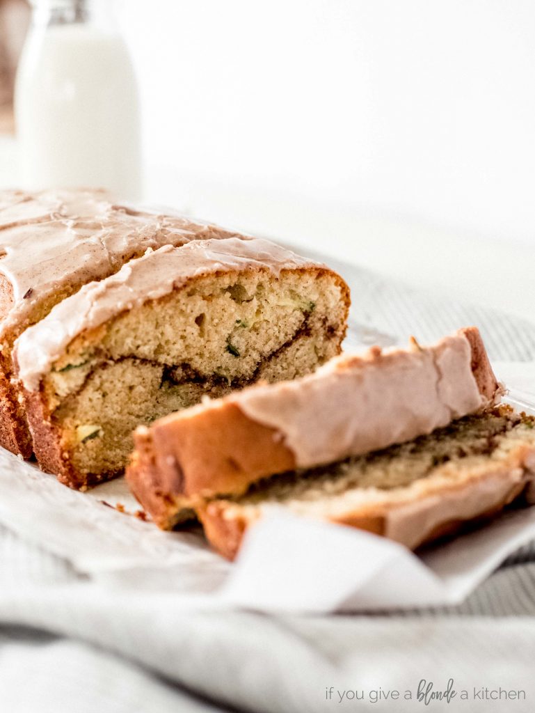 cinnamon swirl zucchini cake close up shot of cake with icing