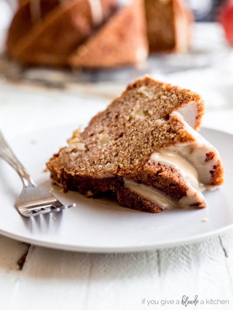 fresh apple bundt cake slice on plate with fork