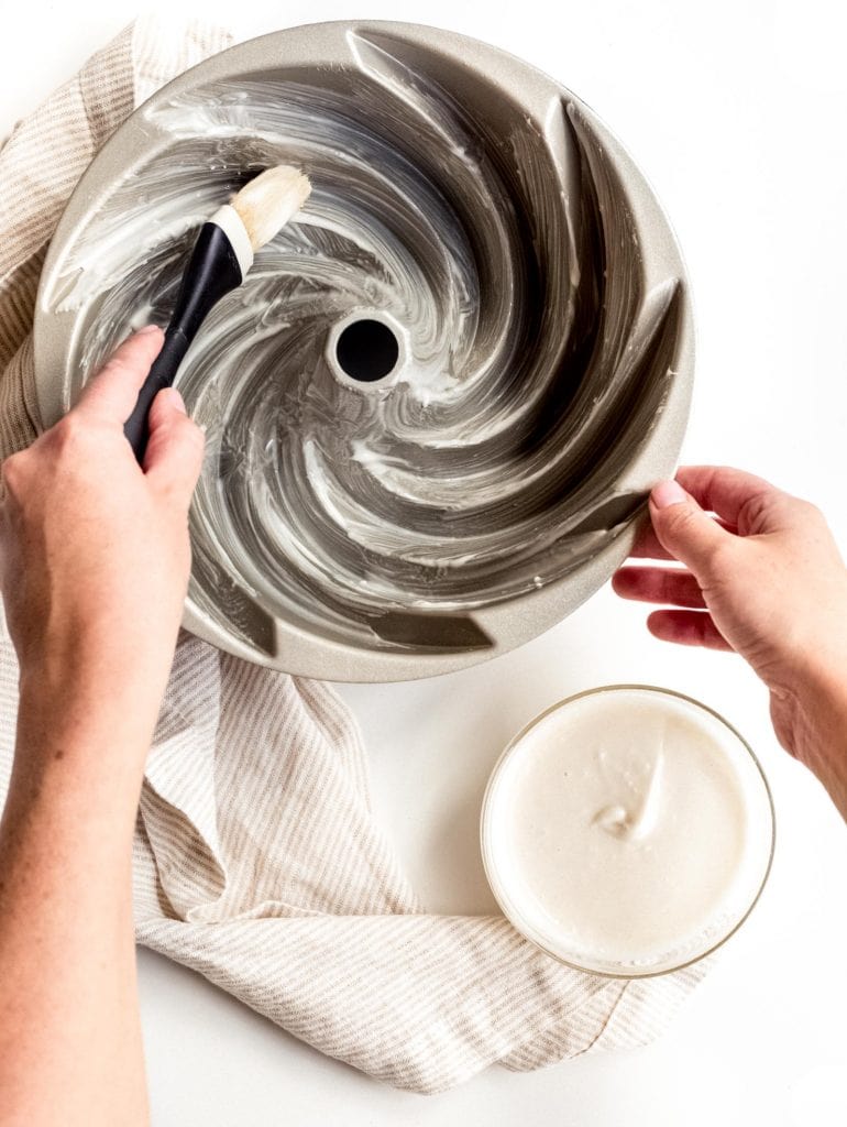 pastry brush greasing bundt cake pan