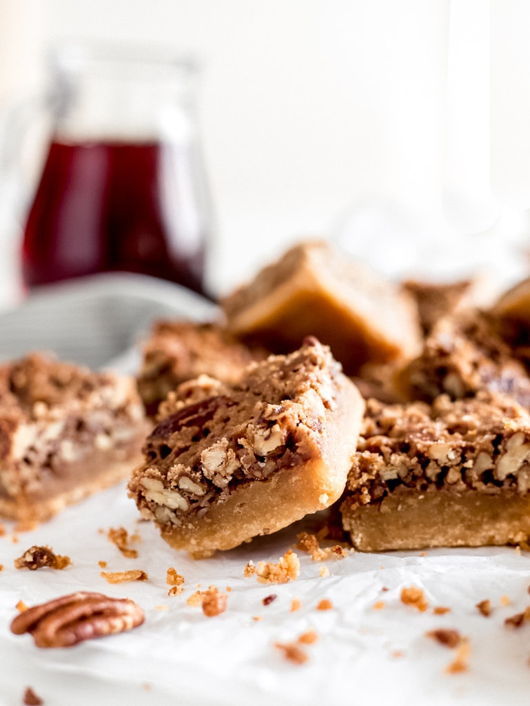 maple pecan bars showing layers of pecan pie filling and shortbread crust