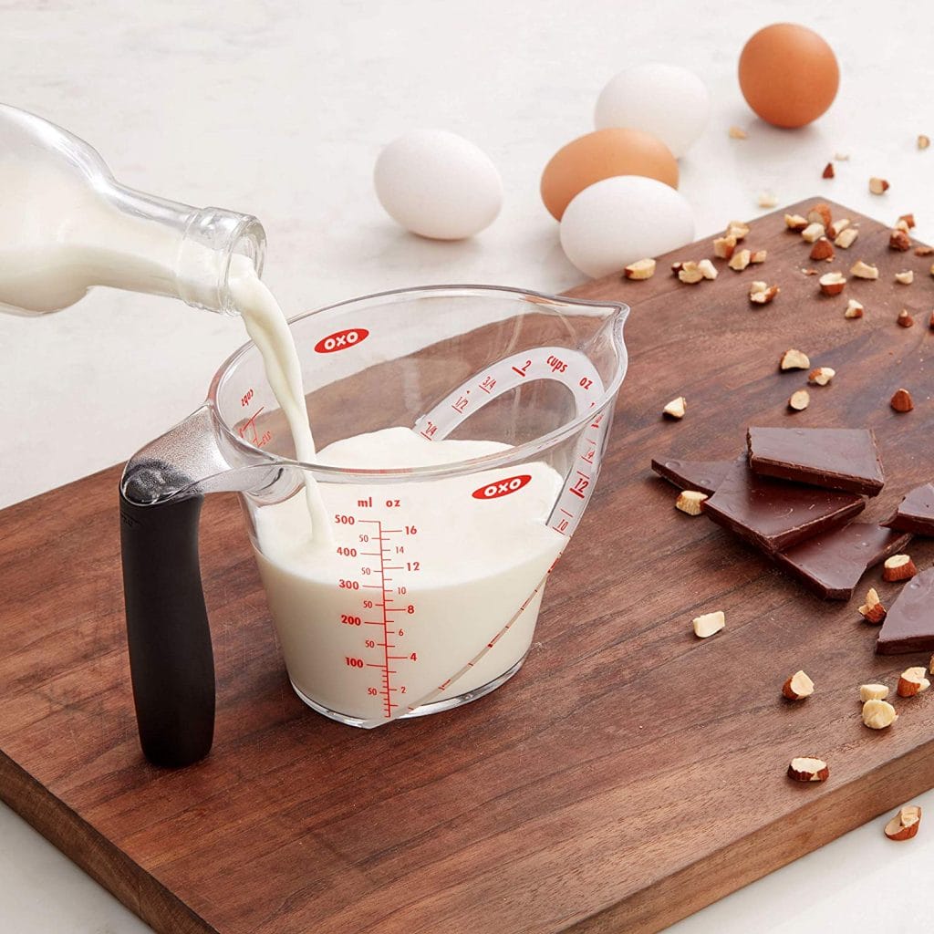 oxo liquid measuring cup milk poured in