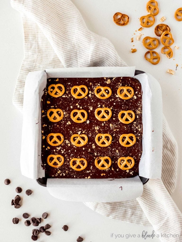 peanut butter pretzel bars with melted chocolate and mini pretzels