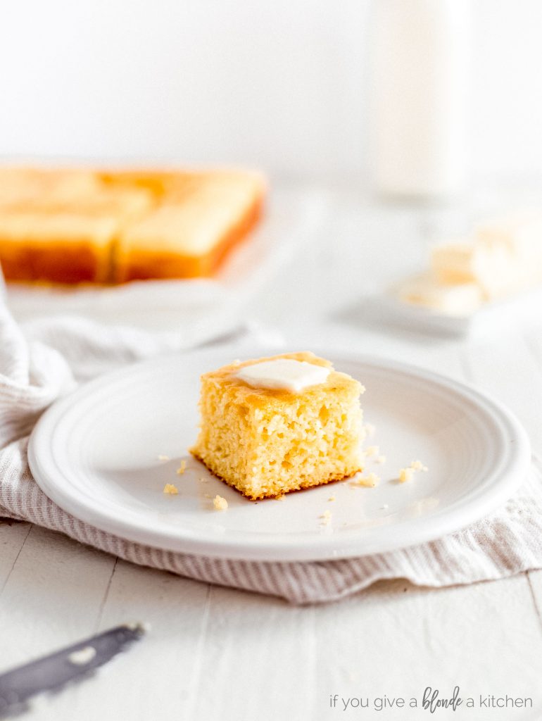 slice of cornbread with pat of butter on top