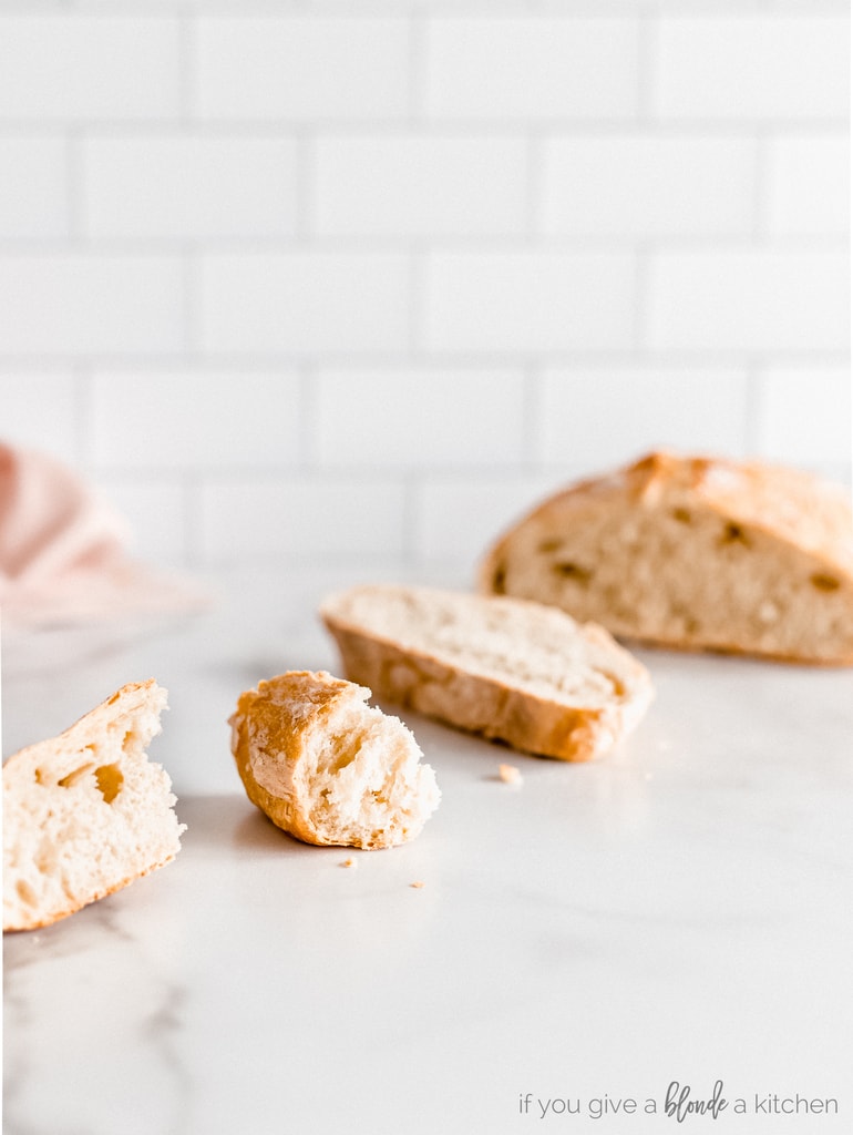 pieces of artisan bread loaf on kitchen counter