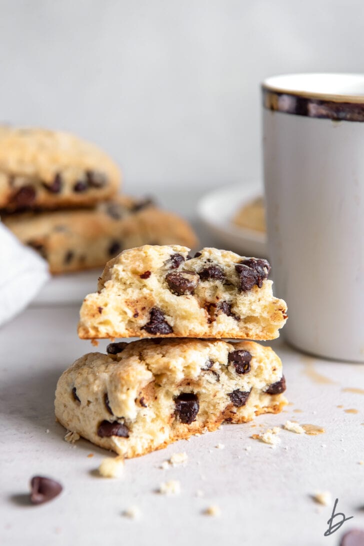 chocolate chip scone broken in half and stacked on top of each other