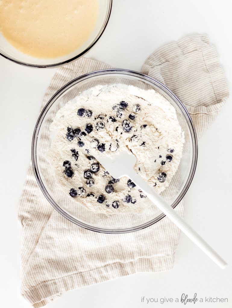 bowl of flour and blueberries