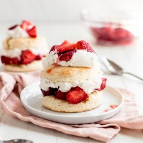 strawberry shortcake layers of biscuit, strawberries and whipped cream