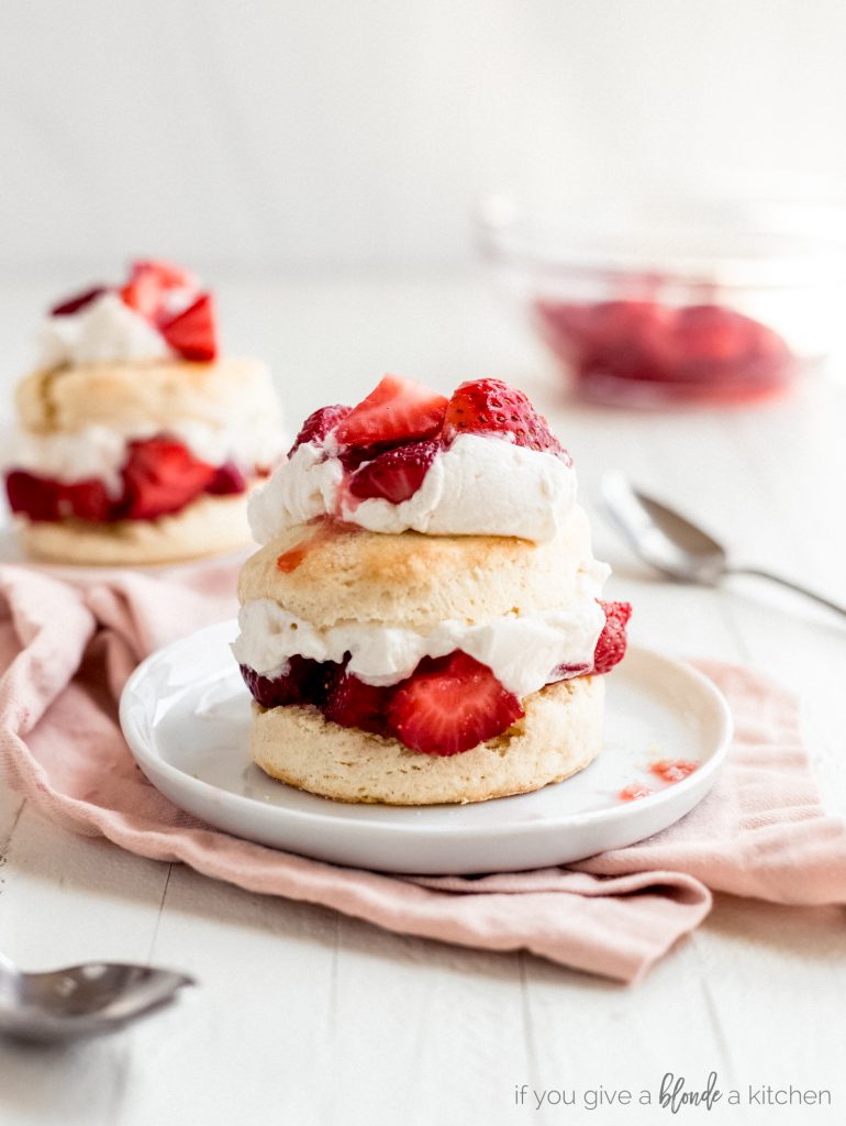 strawberry shortcake layers of biscuit, strawberries and whipped cream