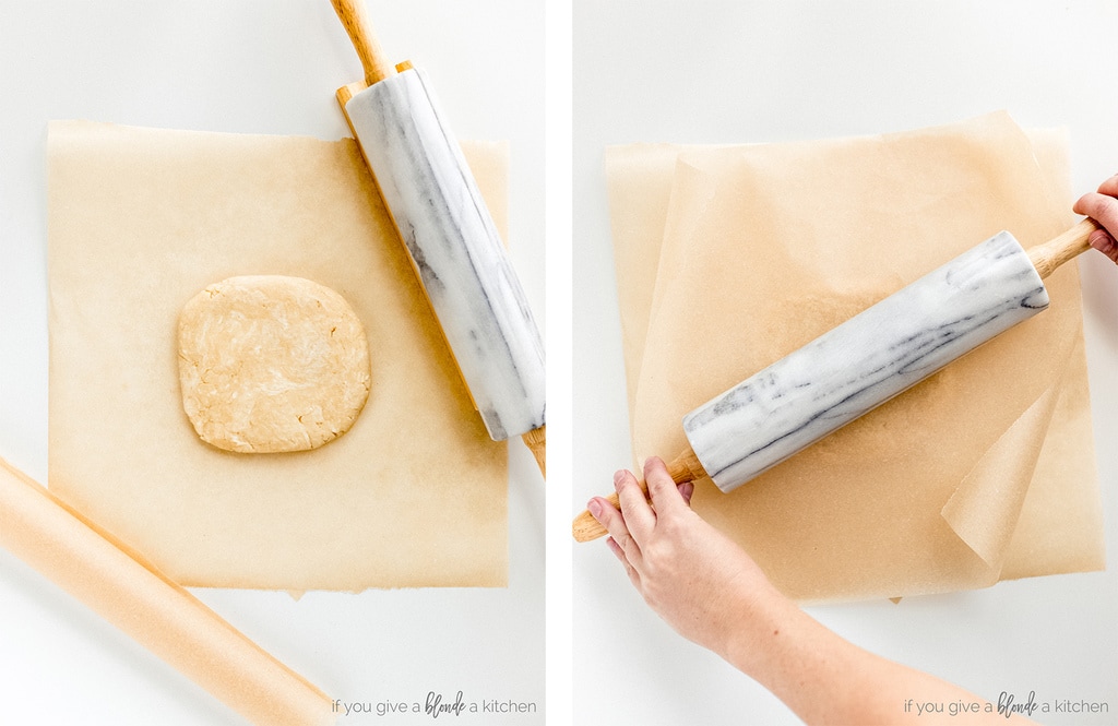 tart crust dough on parchment paper with marble rolling pin
