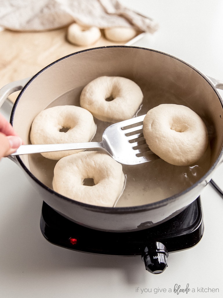 bagels in pot of boiling water