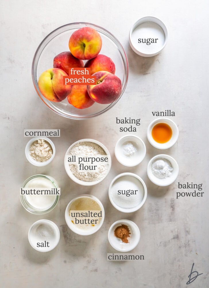 peach cobbler ingredients in bowls labeled with text