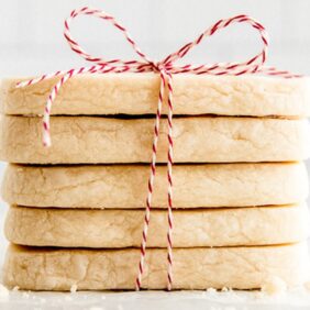 shortbread cookies in a stack and tied in red bakers twine